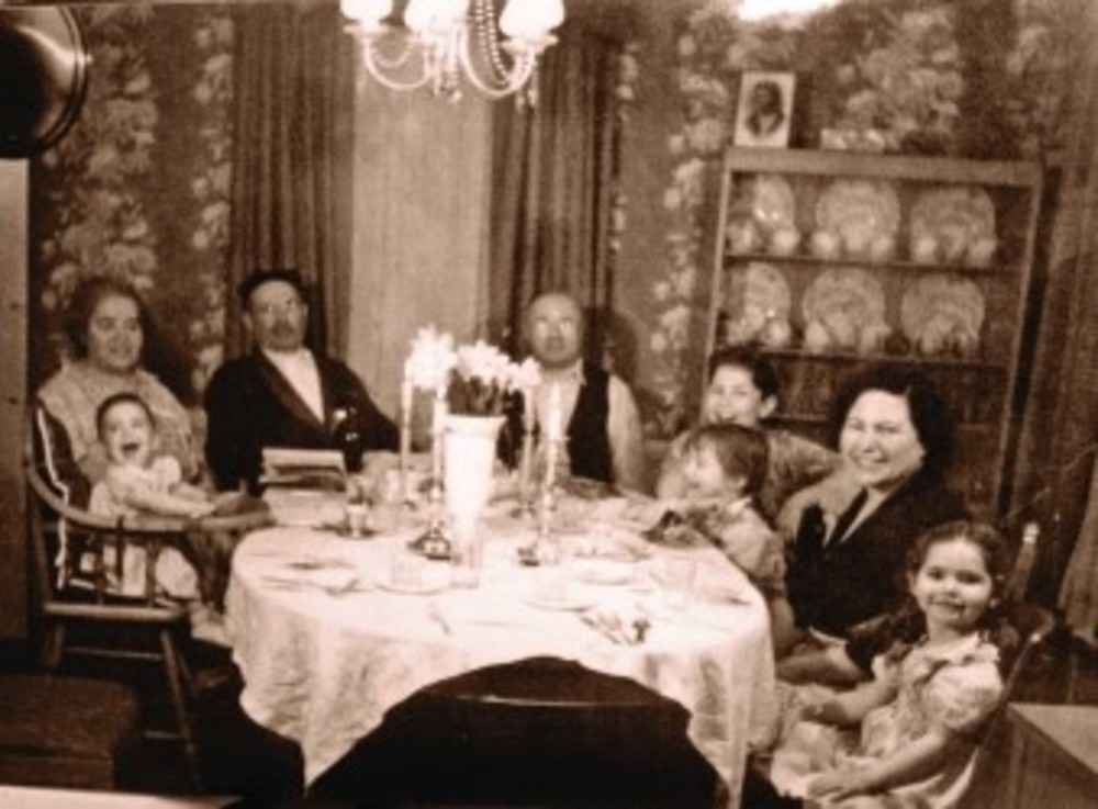  Katz Family Seder, home of Mollie and Harry Katz, Providence, 1948. This photo sits on the mantle of the  Marc Page home, during the sederim, a concrete reminder of dor l’dor, generation to generation. /Debra Page